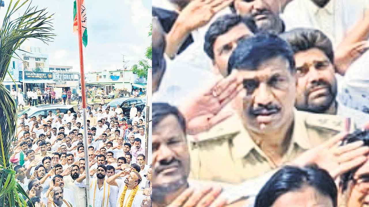 కాంగ్రెస్‌ జెండాకు ఎస్సై సెల్యూట్‌